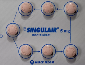 A blister pack of Singulair tablets, a prescription medicine used for asthma and allergies.