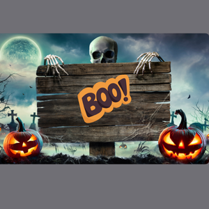 Scary pumpkins in a graveyard with a skeleton holding a wooden board.