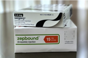 A box of the weight-loss medicine Wegovy is stacked on top of a box of Zepbound, another weight-loss medicine.